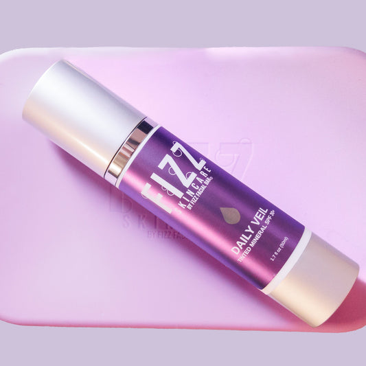 Daily Veil Mineral SPF with purple silicone bag
